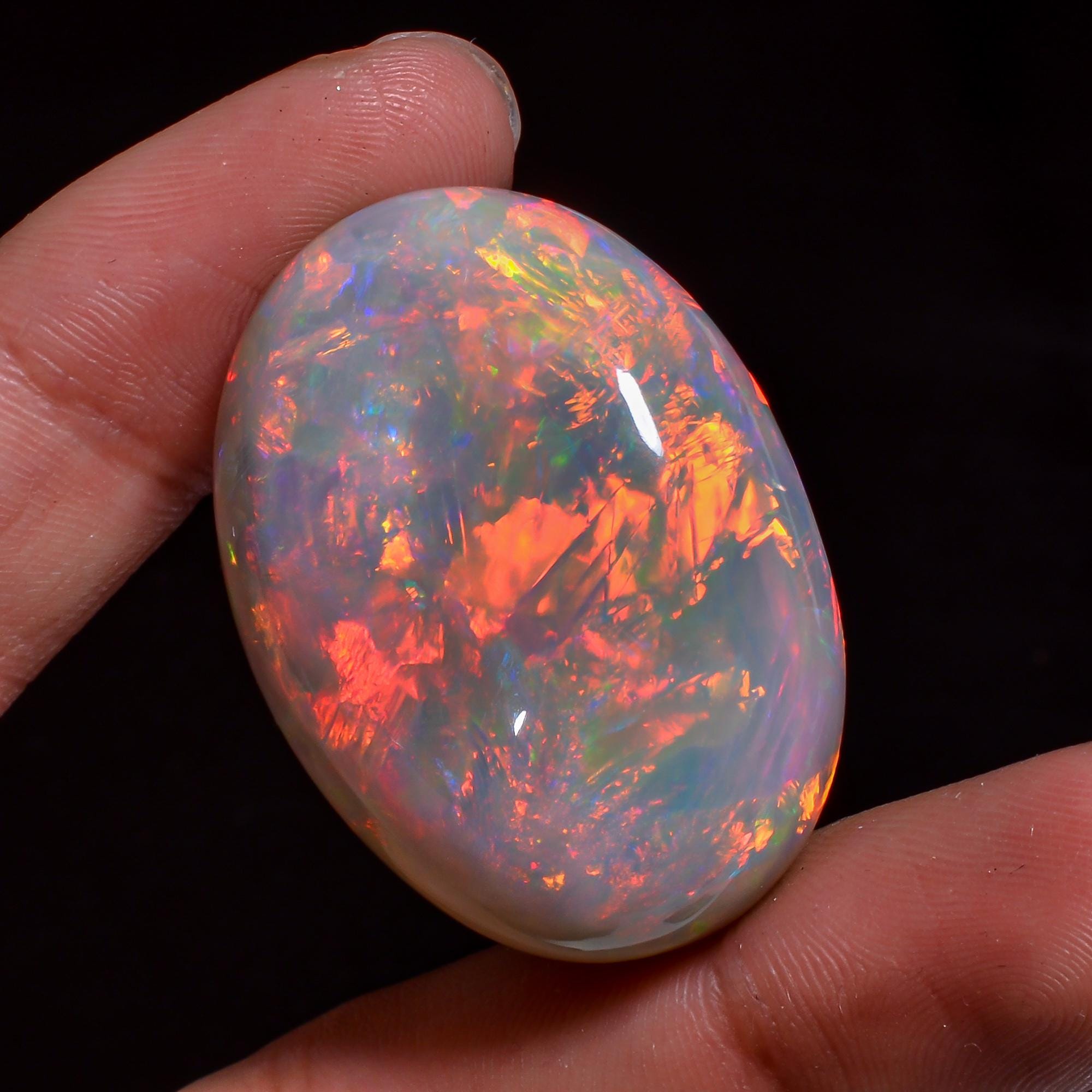 one of a kind natural ethiopian opal oval shape cabochon loose gemstone