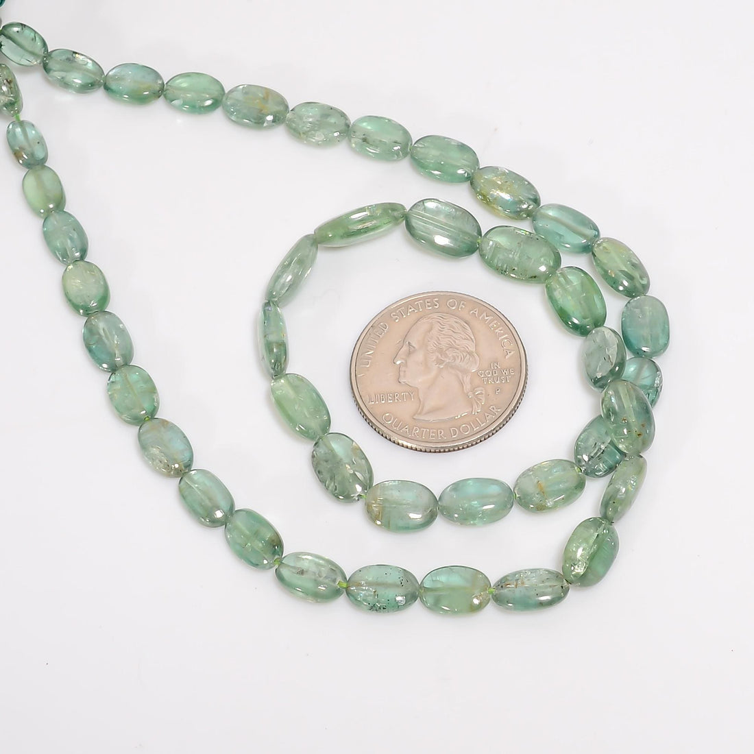 green kyanite natural gemstone oval shape smooth 