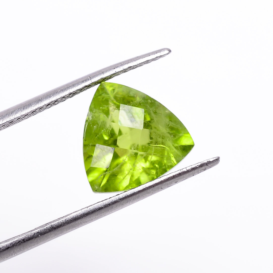 peridot natural trillion shape faceted loose gemstone