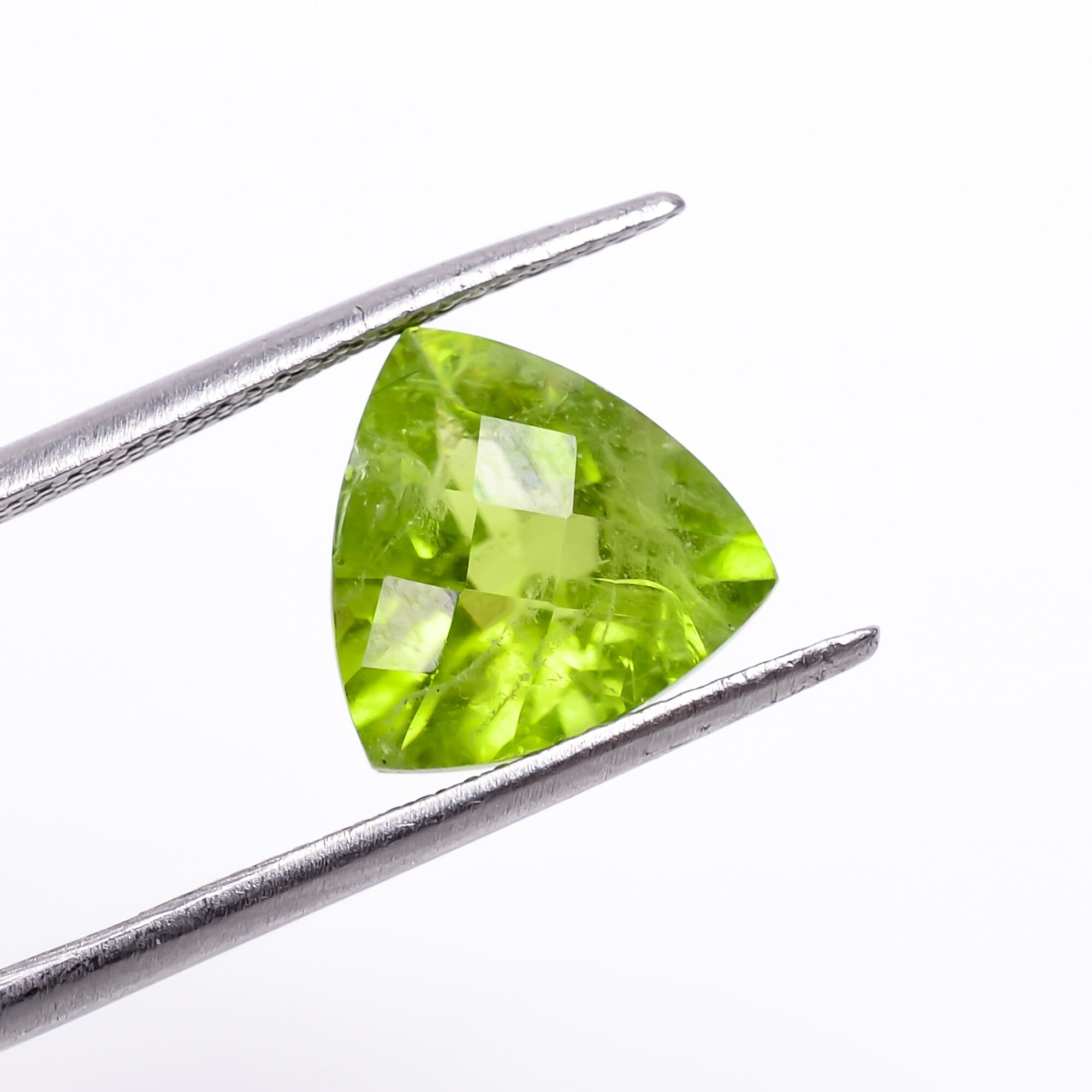 peridot natural trillion shape faceted loose gemstone