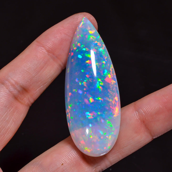 one of a kind natural ethiopian opal pear shape cabochon loose gemstone 52 5 ct 54x21x9 mm y 8386